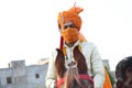 Jodhpur, Rajashtbn, India. 30 June 2020: Indian groom wearing mask sitting on horse, people getting married after ease in lock