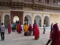 Numerous people in an inner courtyard of the Mehrangarh Fort in the blue city of Jodhpur, India