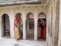 Several women in a porch inside the Mehrangarh Fort in the blue city of Jodhpur, India