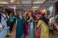 Jodhpur, Rajasthan, India - 19.10.2019 : Females wearing traditional colorful wedding turbans, dancing in Joy, happiness for