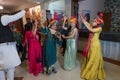 Jodhpur, Rajasthan, India - 19.10.2019 : Females wearing traditional colorful wedding turbans, dancing in Joy, happiness for