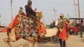 Tourists visit remote deserts to ride a big camel at the famous place.