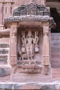 Sculpture of Hindu god in the wall of Mandore Temple