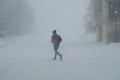 Jogger in Snow Storm Royalty Free Stock Photo