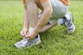 Jogger tying his shoes