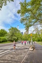 Joggers running through Central Park.