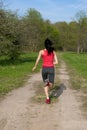 Jogging athletic woman in the park