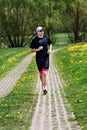 Jogging through the fields Royalty Free Stock Photo