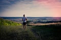 Jogging through the fields Royalty Free Stock Photo