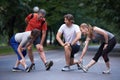 Jogging people group stretching