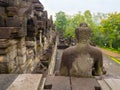 JOGJA, INDONESIA - AUGUST 12, 2O17: Close up of buddha statue and stupa at Borobudur Buddhist temple Candi Borobudur