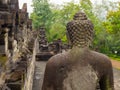 JOGJA, INDONESIA - AUGUST 12, 2O17: Close up of buddha statue and stupa at Borobudur Buddhist temple Candi Borobudur