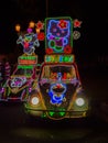 JOGJA, INDONESIA - AUGUST 12, 2O17: A traditional pedicap transport parket at outdoor with colorful and bright lights at