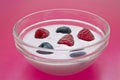 Jogurt glass bowl with raspberries and blueberries