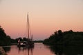 Sail ship at evening sunset on waters of Eernewoude in Friesland Royalty Free Stock Photo