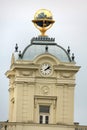 Johannes Kepler statue on vienna facade with gold globus on the