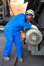 Female Technician checking equipment at Coal Burning Power Station