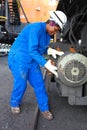 Female Technician checking equipment at Coal Burning Power Station