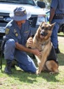 JOHANNESBURG, SOUTH AFRICA - APRIL 2017 South African Police Force police man with K9 german shepherd dog