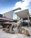 Entrance to mall with sculpture of animals in foreground. Royalty Free Stock Photo