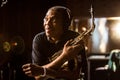 African Artist Femi Kuti, Nigeria posing for a photo with a Saxophone