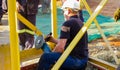 Tradesman working with an angle grinder on a building site Royalty Free Stock Photo