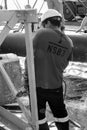 Tradesman working with an angle grinder on a building site Royalty Free Stock Photo