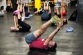 Personal Trainer giving fitness instruction at a Crossfit group class