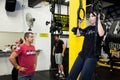 Personal Trainer giving fitness instruction at a Crossfit group class