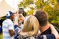 Friends taking a selfie photo at food and wine festival