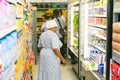 African customers shopping at local Pick n Pay supermarket grocery store