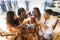 African girls drinking cocktails and generally enjoying a day out at a Food and Wine Fair