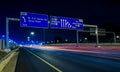 Motorway Signs on Highway at night