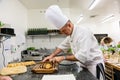 Pastry Chef preparing a gourmet chocolate dessert dish