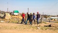 Young African Men walking in urban Soweto South Africa