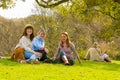 Three young women enjoying a glass of wine at The Winter Sculpture Fair at Nirox Sculpture Park