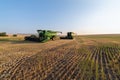 John Deere combines parked in a farm field in Idaho, USA - July 29, 2021 Royalty Free Stock Photo