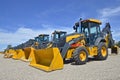 John Deere excavating and backhoes