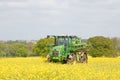 John Deere R4040i sprayer spraying in RSO field Royalty Free Stock Photo