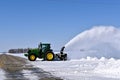 John Deere 6145R Tractor blowing snow