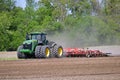 John Deere 9470R tractor pulling a Wil-Rich XL field cultivator