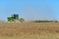 John Deere 9620RX track drive tractor pulling a John Deere 2230FH cultivator