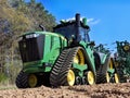 John Deere 9RX 590 track drive tractor ready to cultivate a field