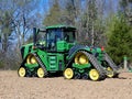 John Deere 9RX 590 track drive tractor ready to cultivate a field