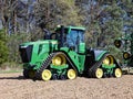 John Deere 9RX 590 track drive tractor ready to cultivate a field