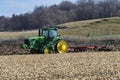 John Deere 8420T track drive tractor pulling a White 445 disk chisel plow