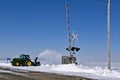 John Deere 6145 Tractor blowing snow