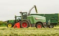 A John Deere tractor with Fendt Katana 65 forager Royalty Free Stock Photo