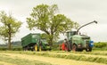 A John Deere tractor with Fendt Katana 65 forager