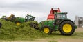 John Deere tractor pushing silage at the clamp